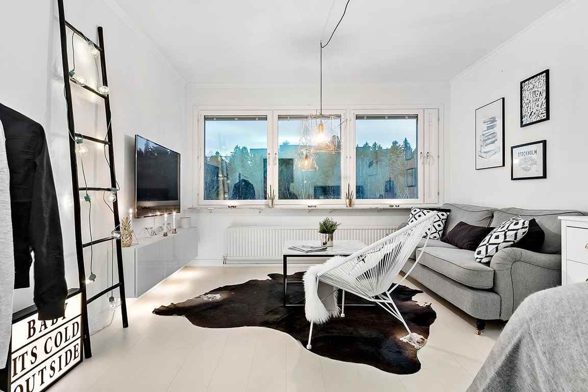 l'idea di utilizzare uno stile scandinavo scuro nell'arredamento