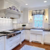 kitchen design with a window in snow-white shades