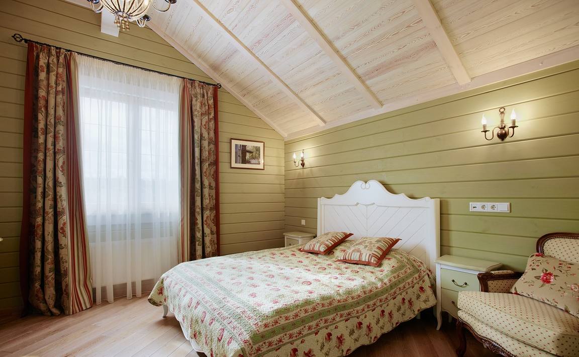 Pistachio shade of walls in a provence bedroom