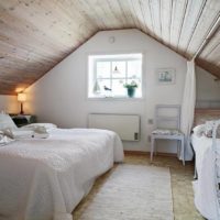 cozy bedroom in a wooden house