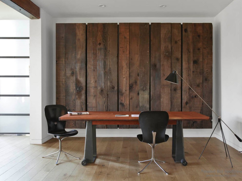 Decorative panel made of wood on the wall of the room