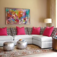 Abstract painting in the design of the wall above the sofa