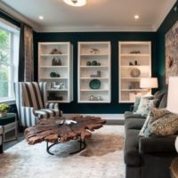 White hanging shelves on the black wall of the living room