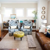 Leather furniture and an old closet in the design of the living room