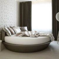 Round bed in the bedroom interior