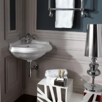 Corner washbasin in a classic style bathroom