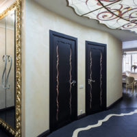 Designer bathroom doors in the hallway