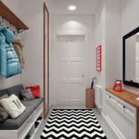 Soft bench and striped rug in the hallway