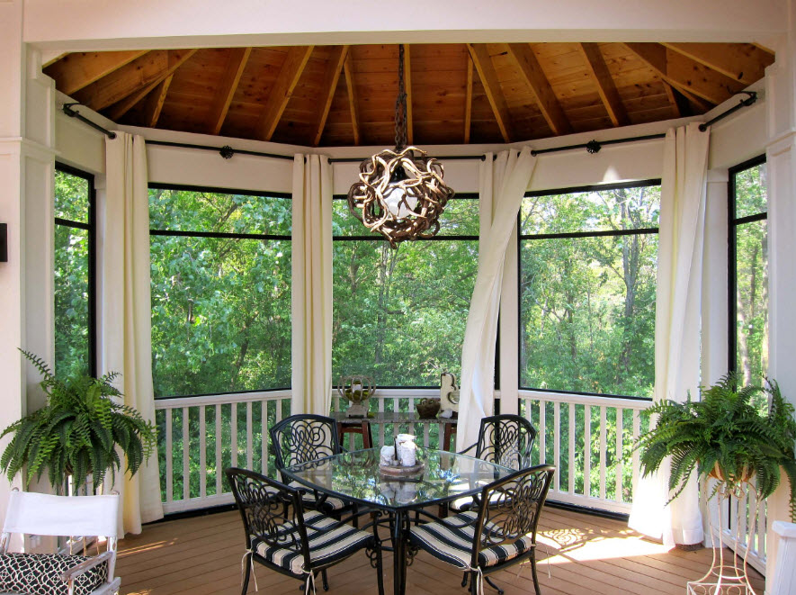 Light curtains on the black ledge in the living room