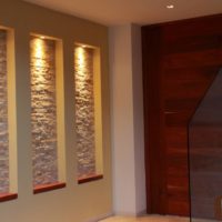 Decorative niches in the hallway, trimmed with stone