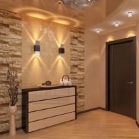 Decorating a wall in a hallway with stone tiles