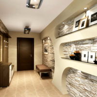 Shelves in the entrance hall with stone trim