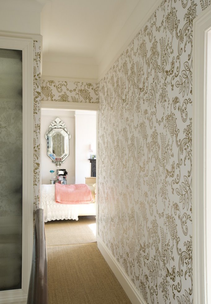 Narrow hallway corridor and wallpaper wall