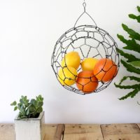 Hanging fruit basket in the kitchen interior