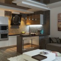 The interior of the kitchen-living room in gray tones