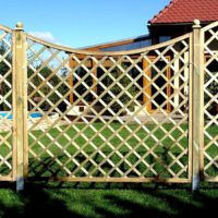 Beautiful wooden fence made of thin slats