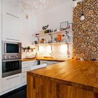 Glued wood worktop and saw panel in kitchen interior