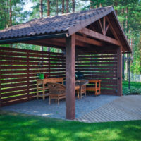 Arbor made of wood in a pine forest