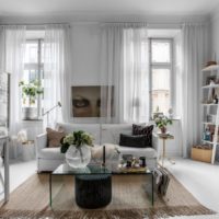 Fresh flowers in the interior of a studio apartment