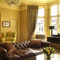 Leather sofa in the center of the living room