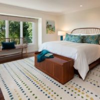 Carpet in the design of the bedroom of a country house