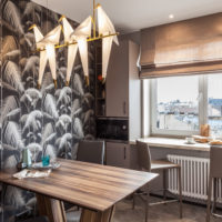 Colorful wallpaper in the kitchen in the men's apartment