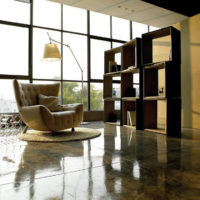 Modular shelving and panoramic windows in the living room of a private house