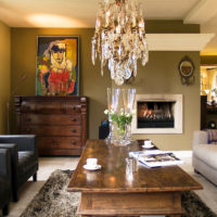 Olive shades in the interior of the living room of a country house