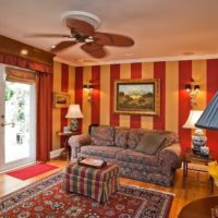 Red and yellow stripes on the wallpaper in the living room