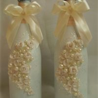 Volumetric stucco molding on bottles wedding