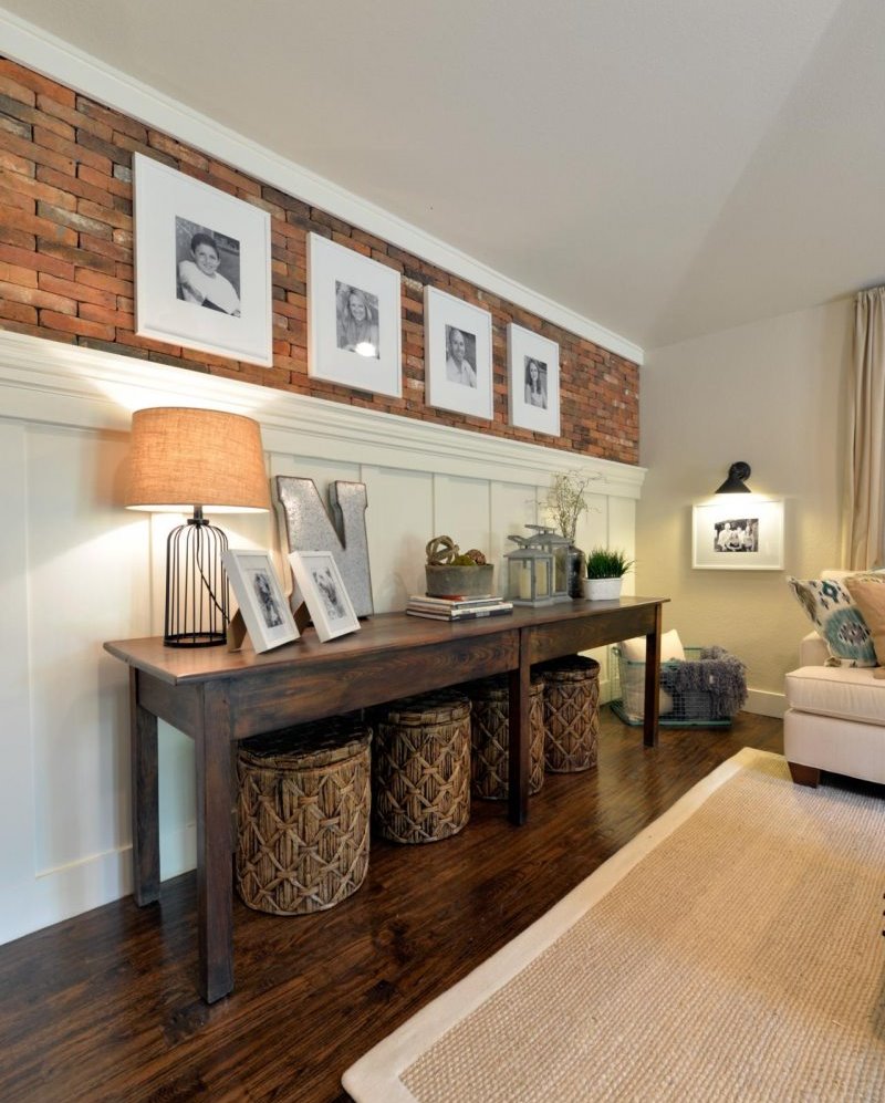 Stylish wooden table in the decor of the living room