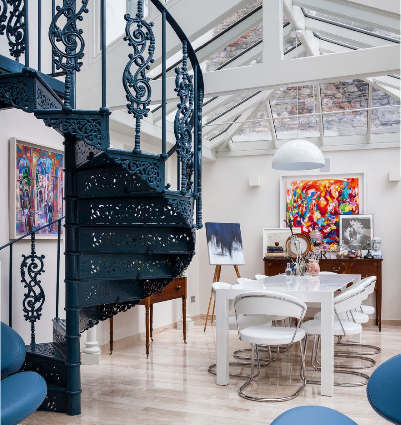 Spiral metal staircase to the second floor of a country house