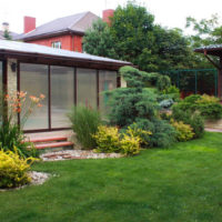 Summer kitchen with panoramic glazing