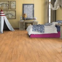 Hut on brown linoleum in the nursery