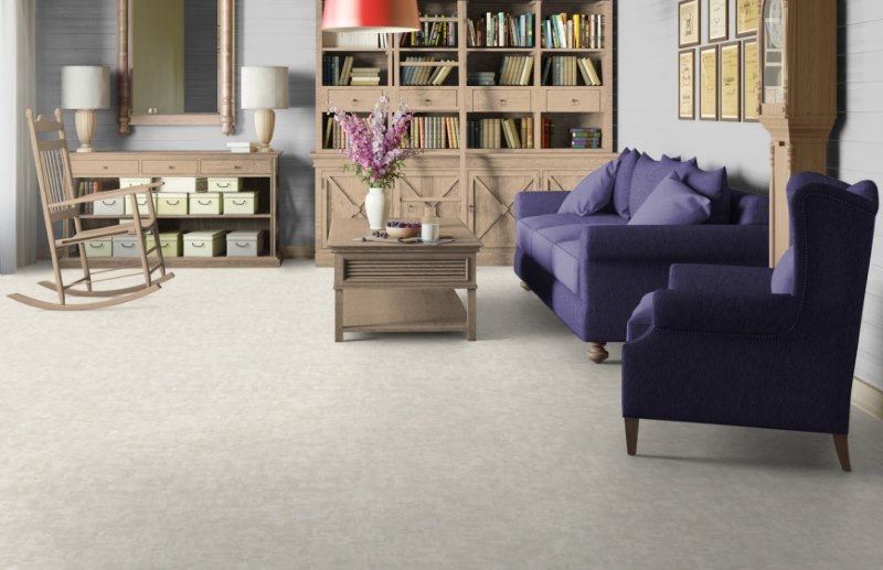 Bright plain linoleum in the living room with wooden furniture