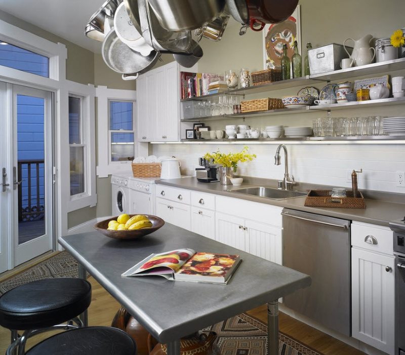 Metal kitchen table in the interior of a modern kitchen