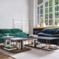 Turquoise sofa in the living room of a residential building