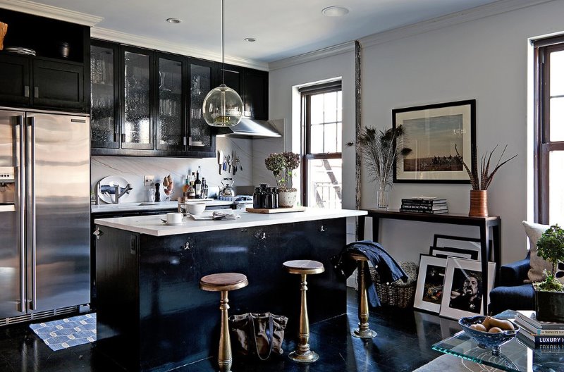 Interior of a modern kitchen-living room in a man’s apartment