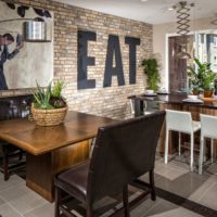 Brick wall with the inscription in the living room