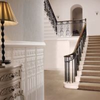 Embossed wallpaper in the corridor of a private house