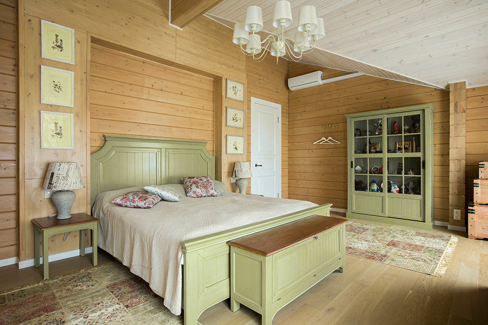 Dizajn spavaće sobe s maslinovim namještajem i drvenim zidovima