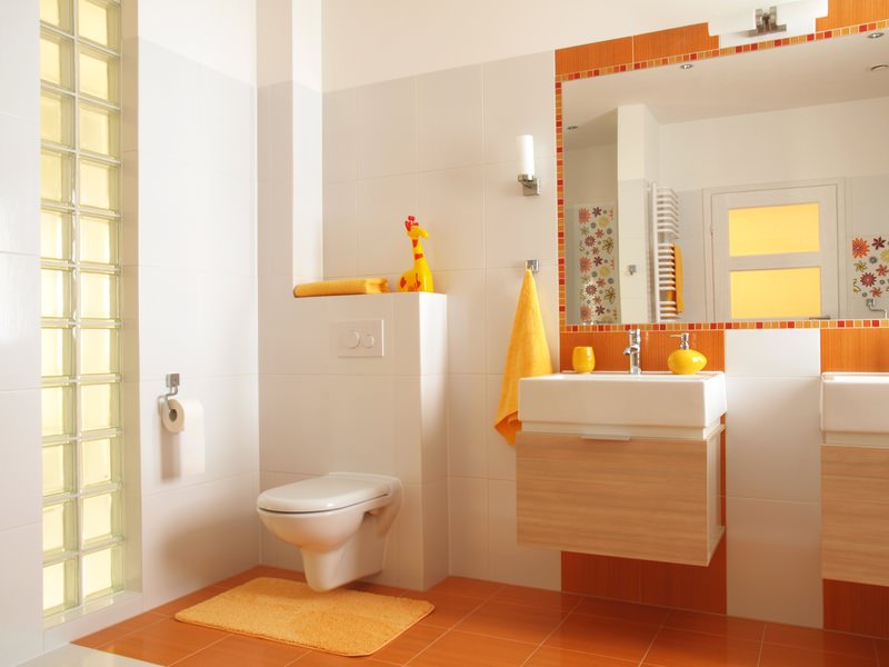 Orange bathroom interior in a young family apartment