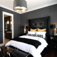 White moldings and dark gray walls in the bedroom