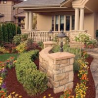 Front door decoration with blooming annuals