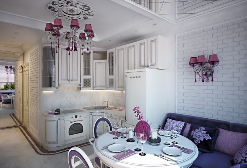 Dining area with round table in the combined kitchen