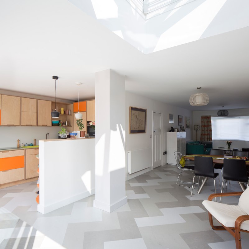 Interior of a studio apartment in bright colors with linoleum on the floor