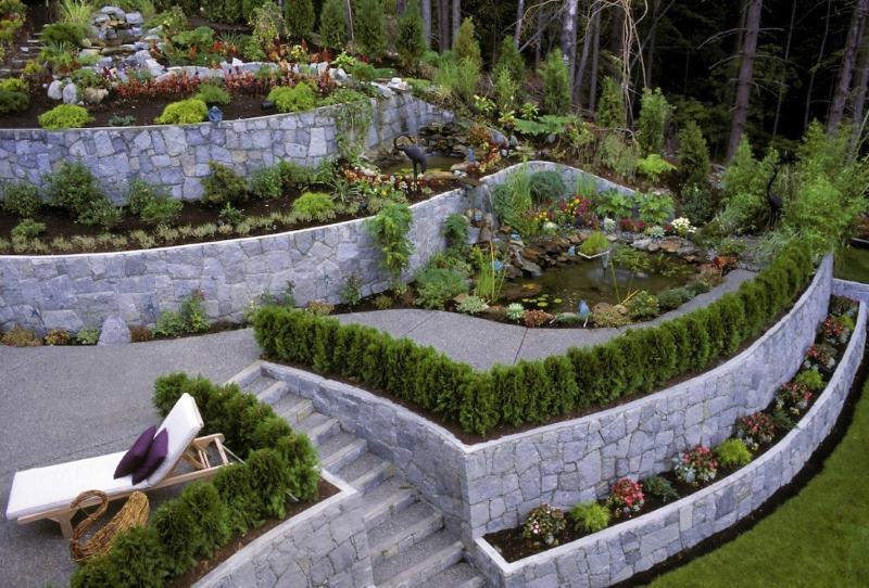 Stone terraces with ponds on the slope of a suburban area