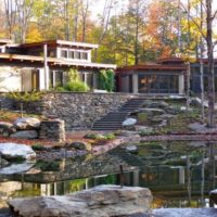 Country house on the high bank of a natural reservoir