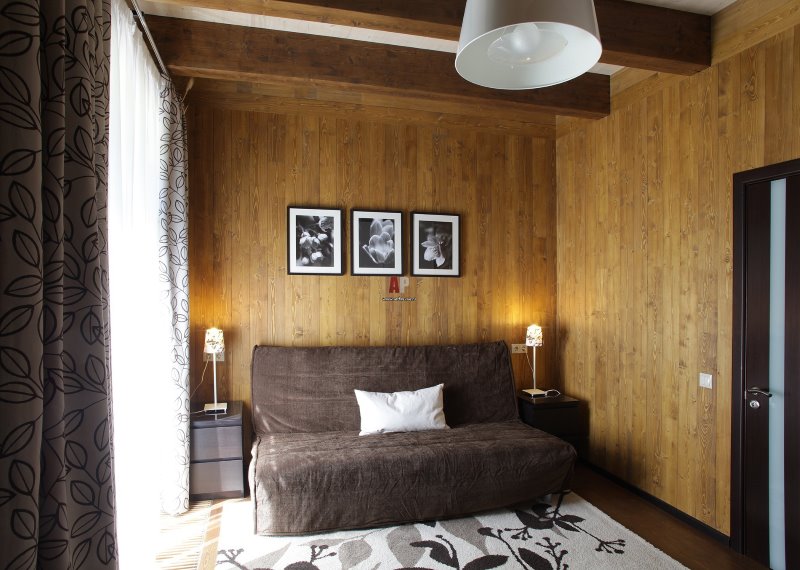 Wall decoration with clapboard in the living room of a country house