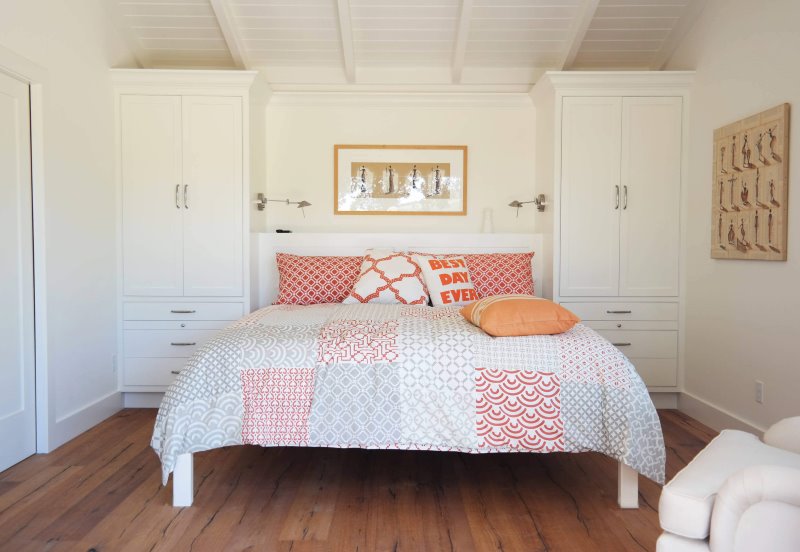 Built-in wardrobes in the design of the bedroom of a country house